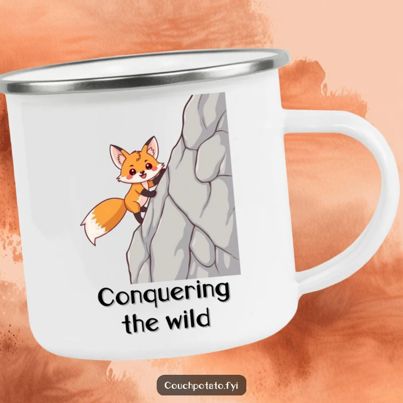 Funny fox camping mug showing a smiling, triumphant fox scaling a steep rock face, ideal for rugged humor.