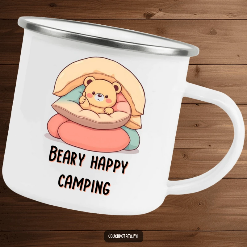 Funny round bear camping mug with a small, round bear nestled in cushions, giving a thumbs up, perfect for warm drinks outside.