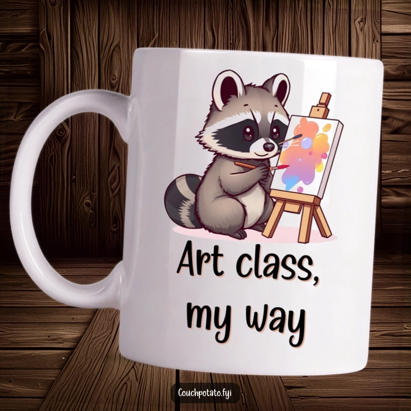Funny curious raccoon painting with focus on a small canvas, depicted on a ceramic mug, radiating artistic mischief.