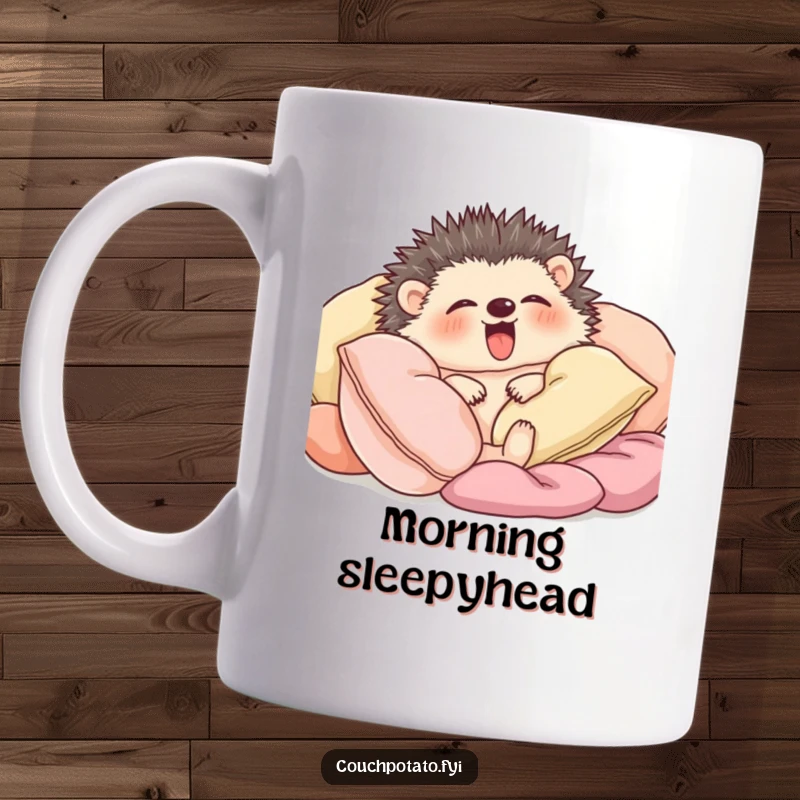 Funny content hedgehog snuggled amongst soft cushions yawning widely on a ceramic mug.