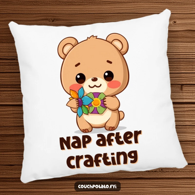 Funny pillow featuring a cute bear cub proudly displaying its finished craft, adding charm to home decor.
