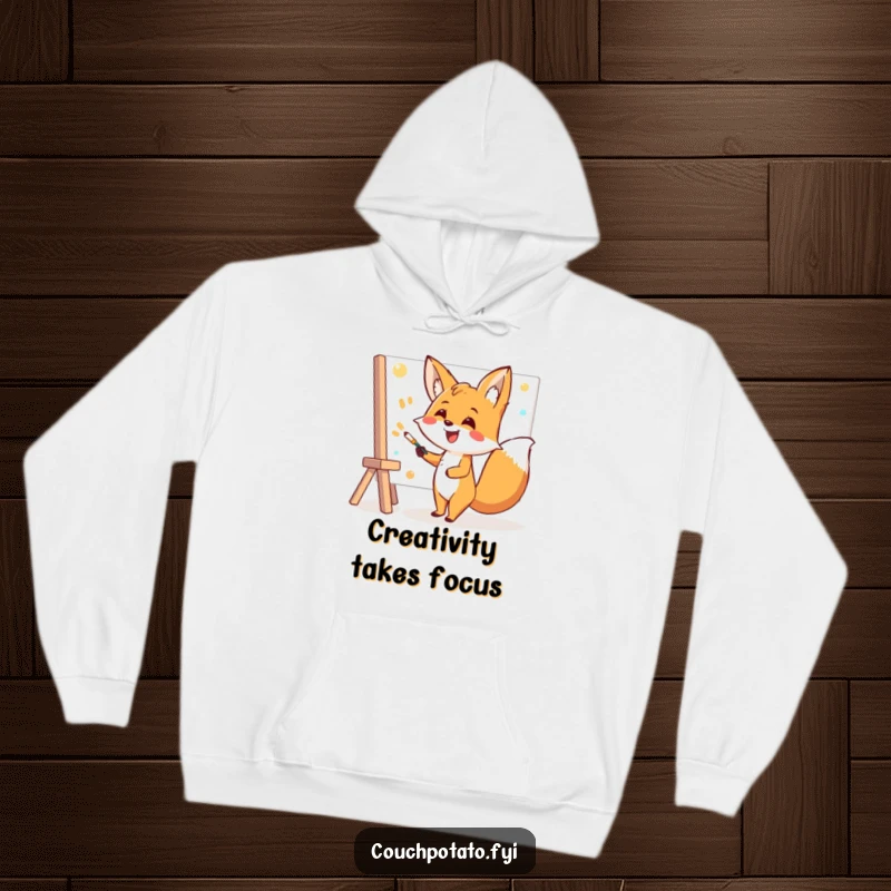 Funny Fox Hoodie: A beaming fox artist joyfully tackles a large canvas with a paintbrush, embodying pure creative energy.