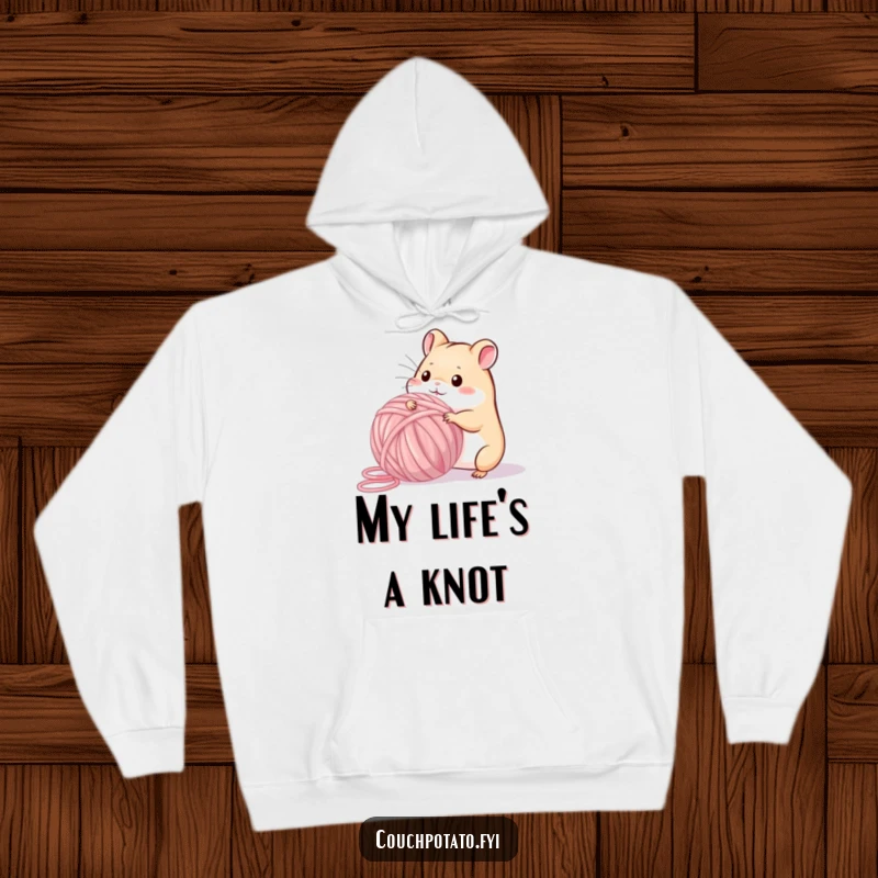 Funny, playful hamster hilariously winding a giant ball of yarn, featured on a warm, funny hoodie.