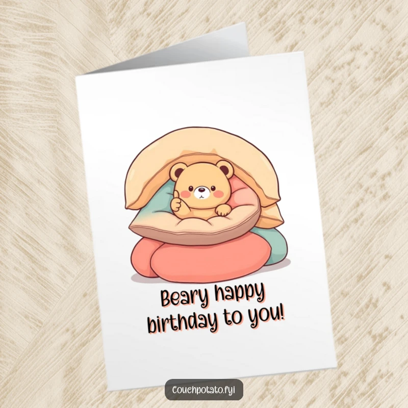 Funny Free Printable Birthday Card: Small round bear nestled in cushions, giving a thumbs up with a happy expression.
