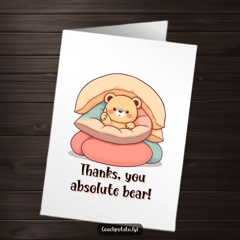 Funny Free Printable Thank You Card: Small round bear nestled in cushions, giving a thumbs up, expressing heartfelt thanks with a smile.