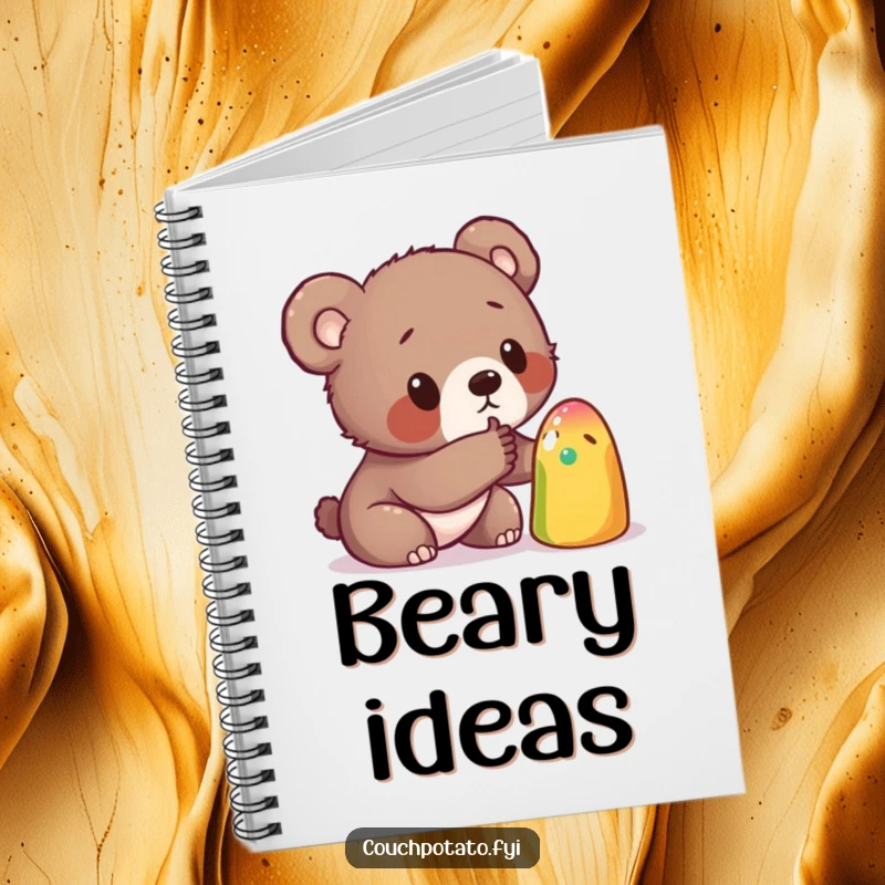 Funny notebook cover featuring a curious bear cub poking a strange, colorful object, inspiring creativity and organization with its sense of wonder.