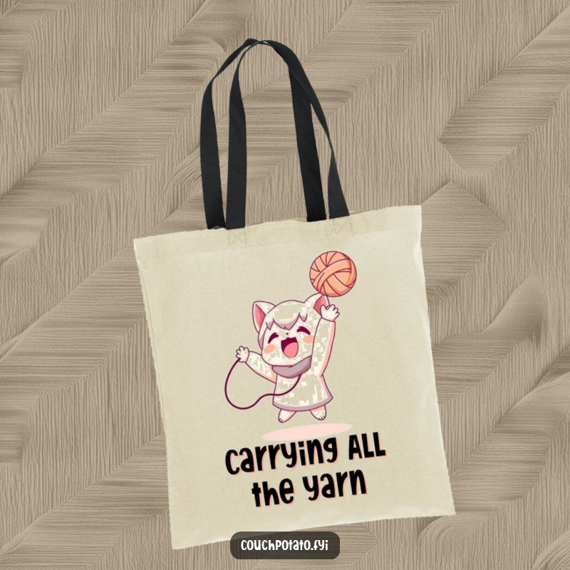 Funny tote bag illustrating a character gleefully tossing a ball of yarn, perfect for hauling craft supplies with a smile.