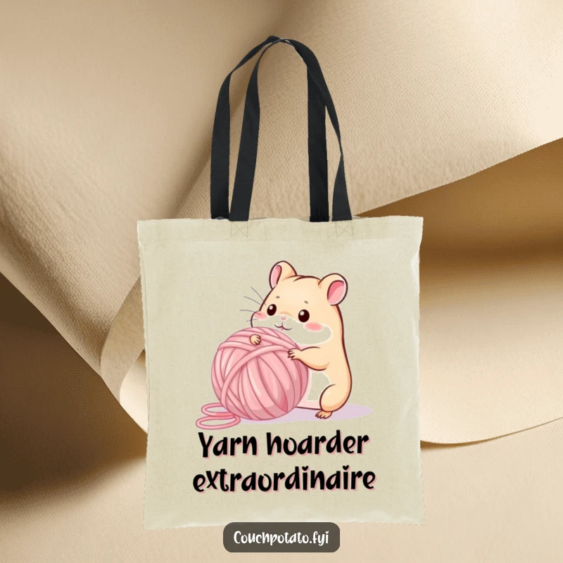 Funny playful hamster winding a huge ball of yarn, depicted on a durable, funny tote bag.